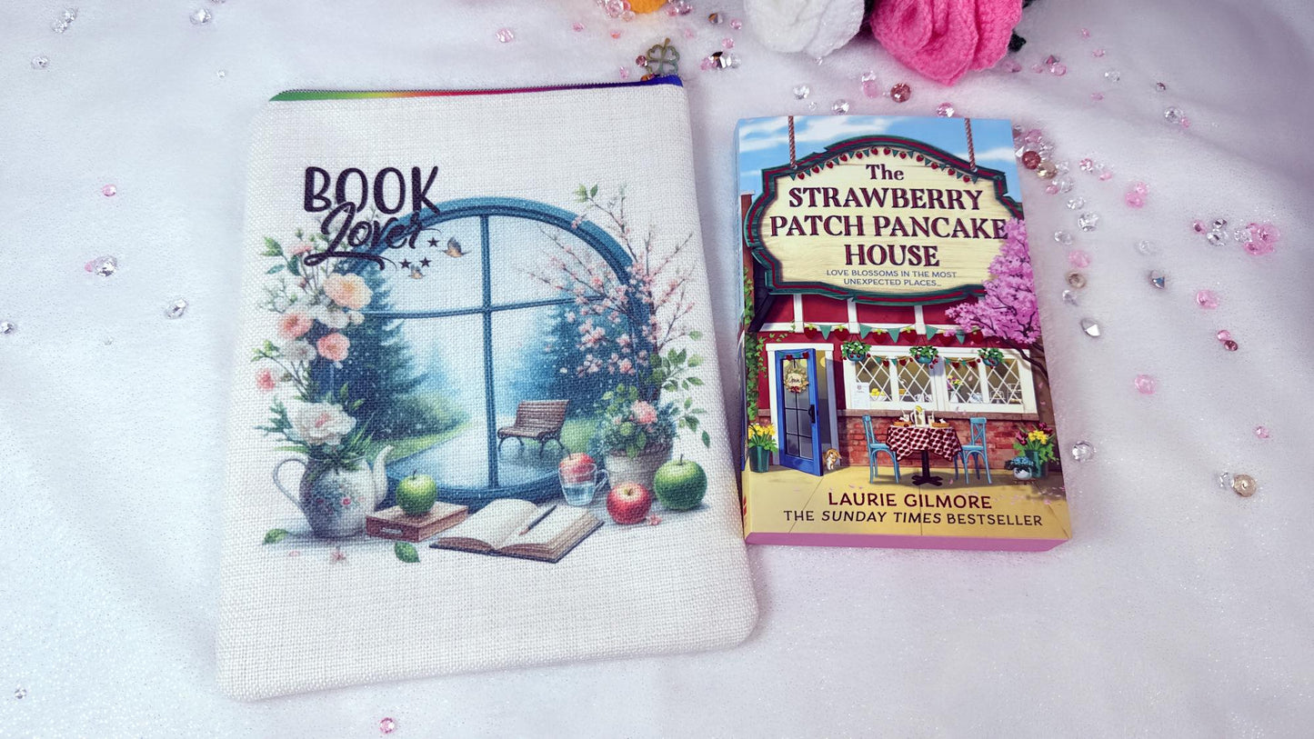 Personalised Handmade book sleeves by RoxanaRoveno perfect gift for a book lovere designed with a rainy window with spring flowers perfect size for book s like 'the strawberry patch pancake house' by Laurie gilmore