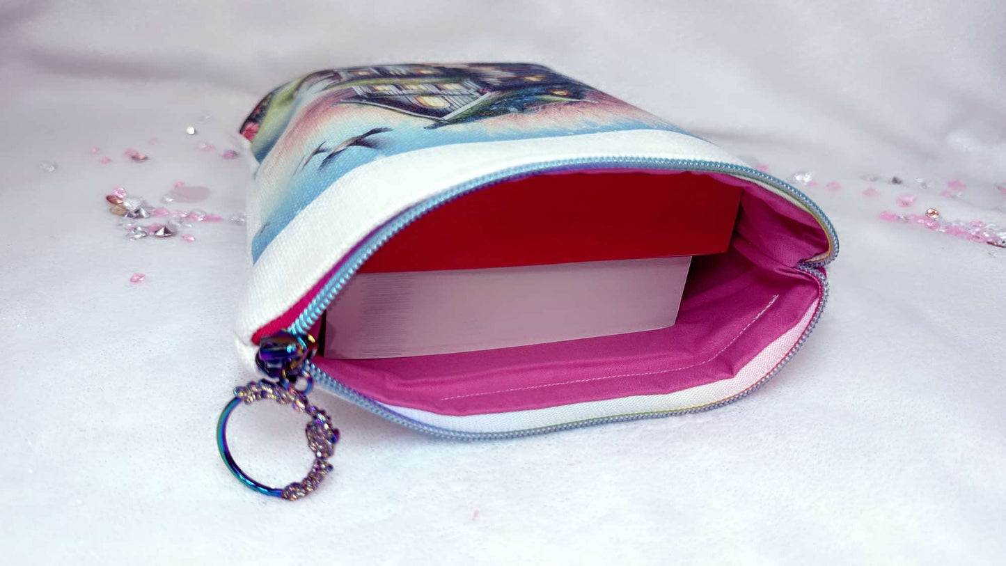 Personalised book sleeve by Roxana Roveno designed with a girl around spring flowers and a quote 'All things are possible if you Believe' an back side a house of books in a spring background special gift for a book lover perfect fit for two paperack books