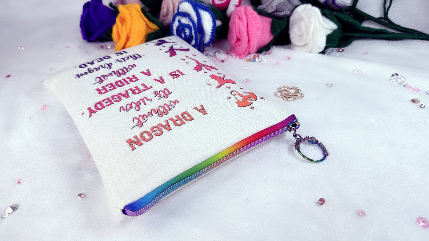 handmade personalised book sleeve "Dragon Rider, Book Lover" made from the highest quality materials and vibrant colors. The rainbow zip adds a stylish touch while providing excellent protection for your books, ensuring they remain safe wherever you go. These unique book sleeve provide protection for your favorite books, journals or notebooks. designed by roxana roveno with rainbow zipp