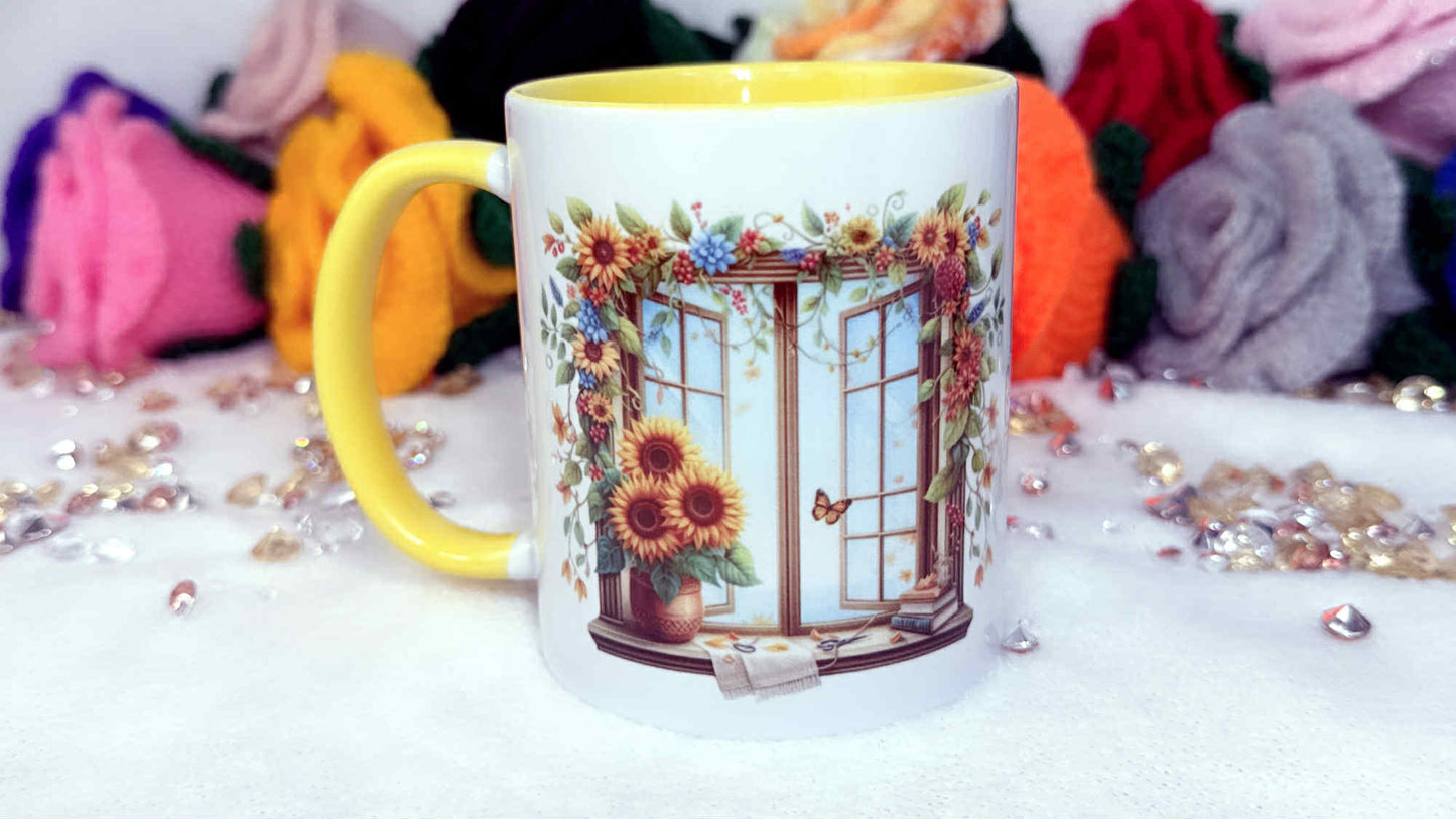 Mug with floral design on a white surface with colorful fabric in the background