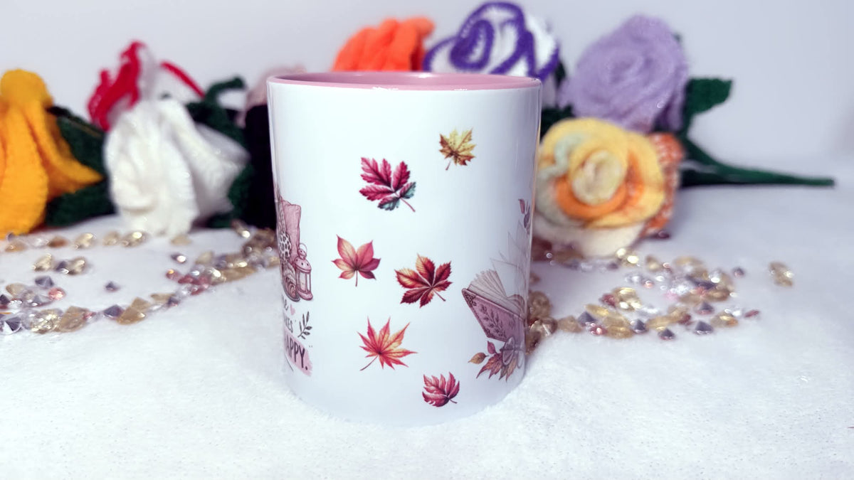 Autumn book lover mug with colourful falling leaves and pink interior