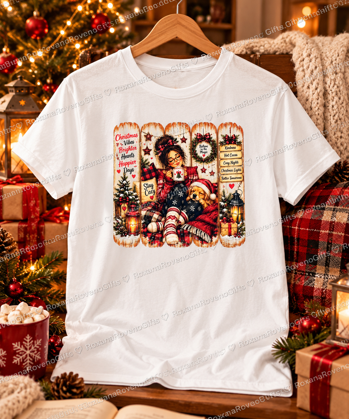 White cotton Christmas T-shirt featuring a cosy girl with a festive mug, a dog wearing a Santa hat and colourful Christmas decorations, by RoxanaRovenoGifts.