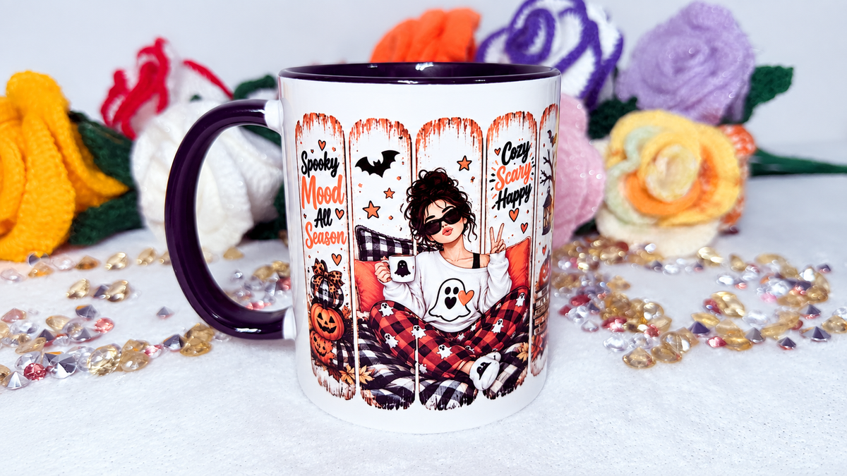 Autumn book lover mug with cosy reader, spooky season and pumpkin design, left view