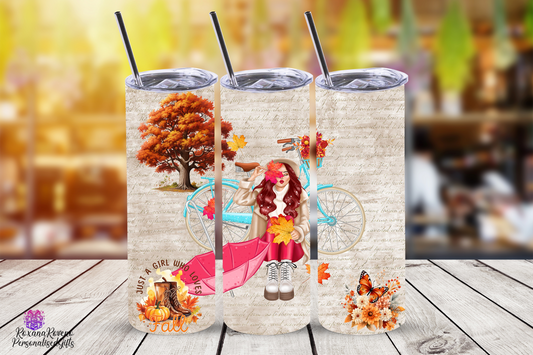Three insulated tumblers with autumn-themed designs on a wooden surface. designed by RoxanaRoveno, personalised gifts UK