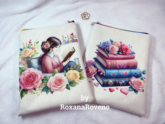 handmade book sleeve designed by roxana roveno one side with a girl reading between flowers and quote 'I Love Books' and other side with a stack of books with flowers on top