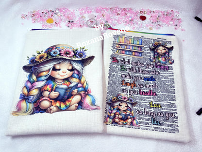 Personalised gift set for a book lover by roxana roveno designed book sleeve with a rainbow girl reading 