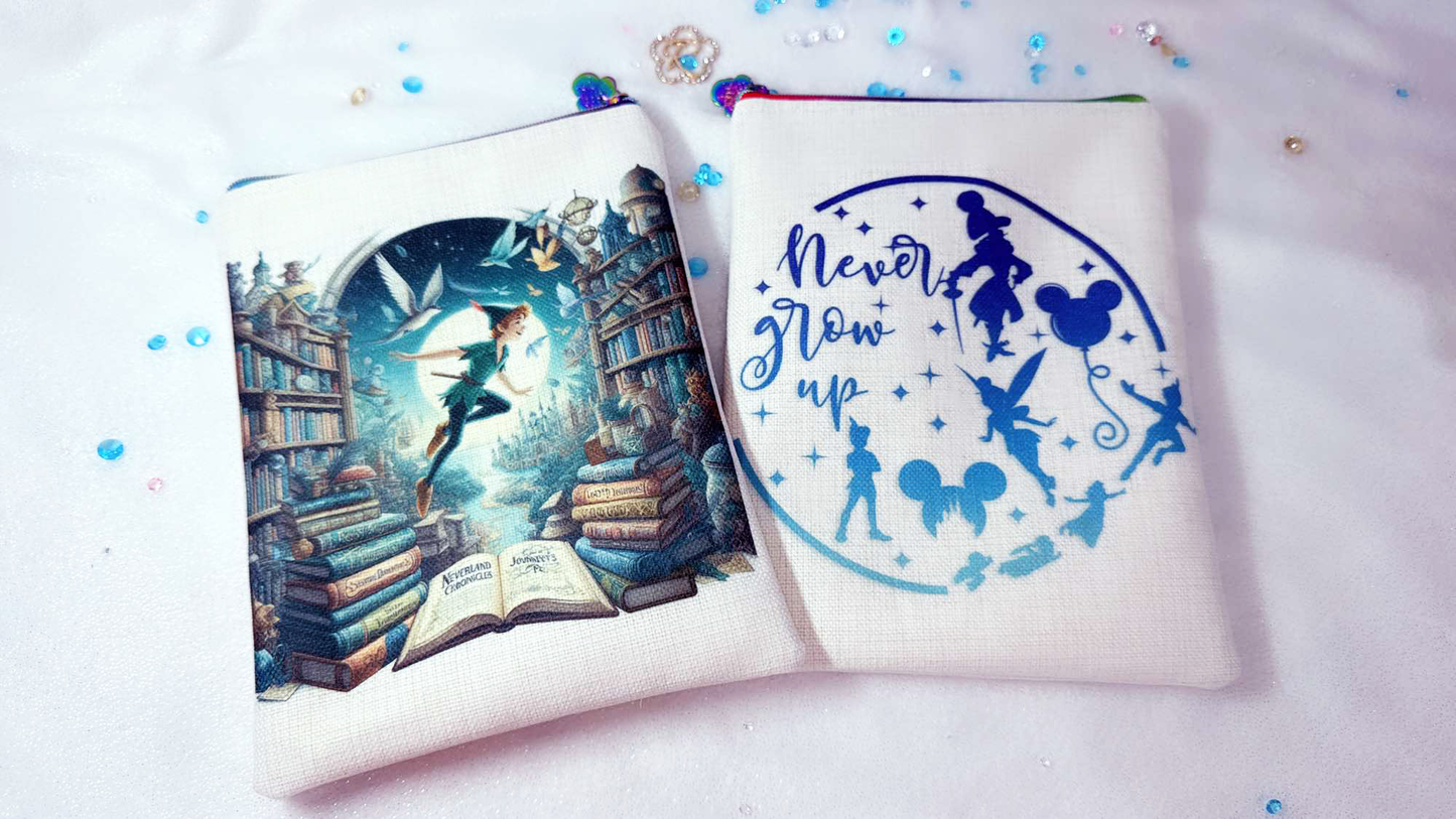 Personalised book sleeve handmade by Roxana Roveno with a special design inspired by classic stories Peter Pan flying between books front side and back side with quote 'never grow up' 