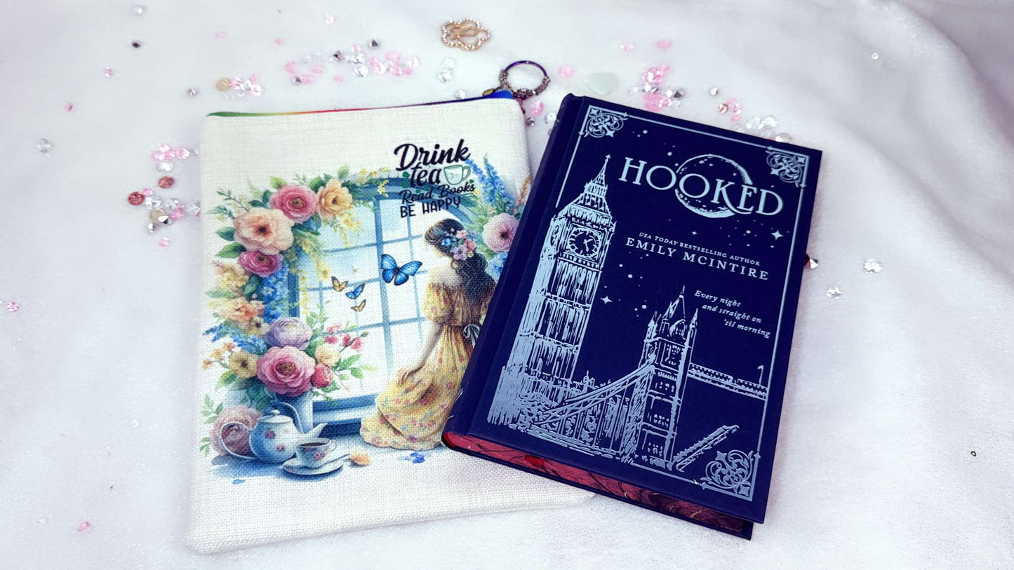 Personalised book sleeve by Roxana Roveno Special designed With Flowers and books special gift for a book lover perfect for Mother's day and Woman's day front design with quote 'Drink tea Read Books Be Happy' perfect size for books like 'Hooked'