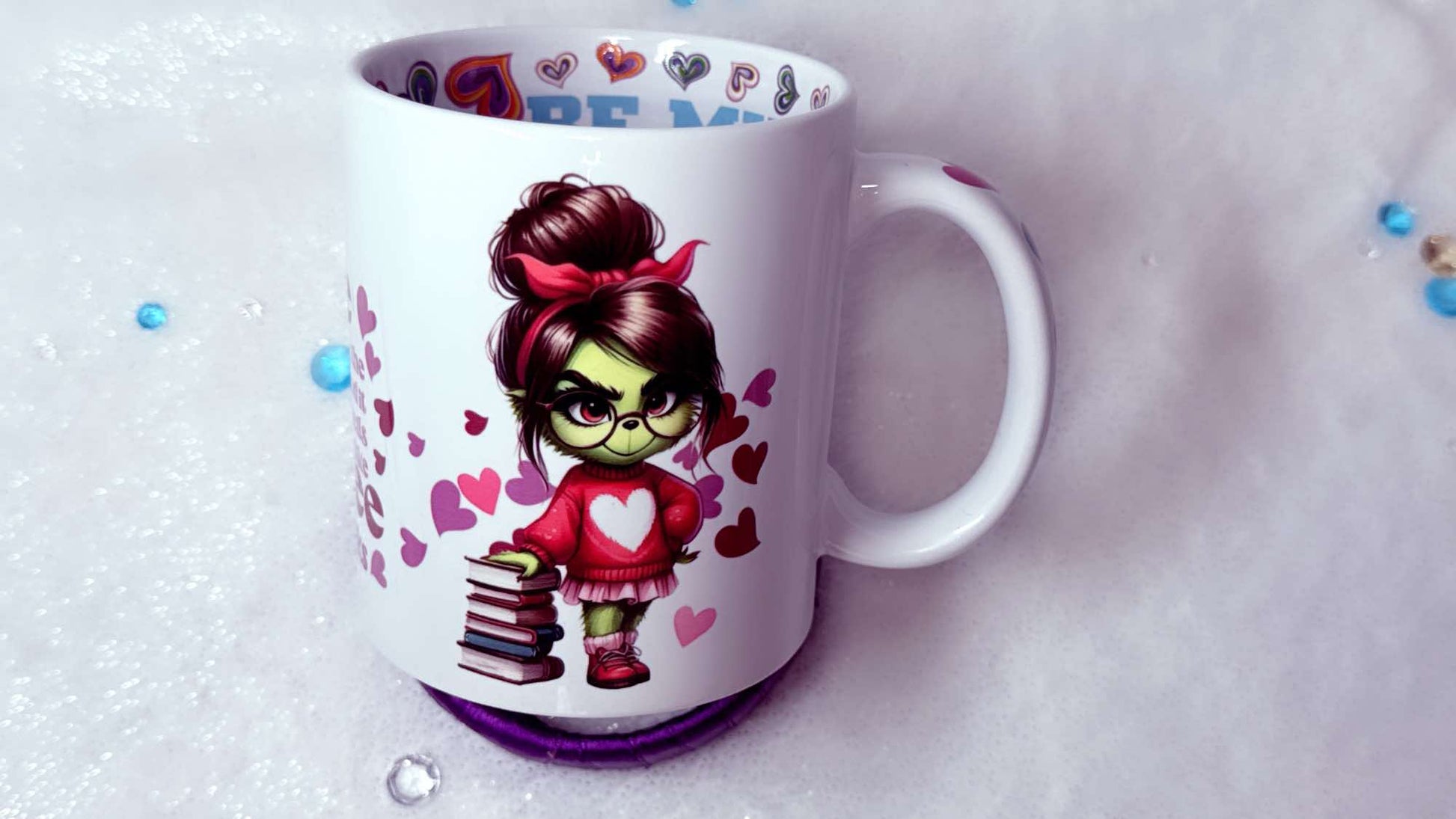 personalised mug by Roxana Roveno With a green girl holding a stack of books best gift for her best gift for Valentines Day  around hearts