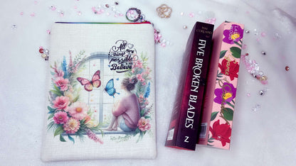 Personalised book sleeve by Roxana Roveno designed with a girl around spring flowers and a quote 'All things are possible if you Believe' special gift for a book lover specal gift for woman's daya and mother's day