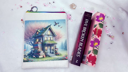 Personalised book sleeve by Roxana Roveno designed with a house of books in a spring background special gift for a book lover perfect fit for books like 'five broken blades' and 'a game of scandal' perfect gift for Woman's day and Mother's day