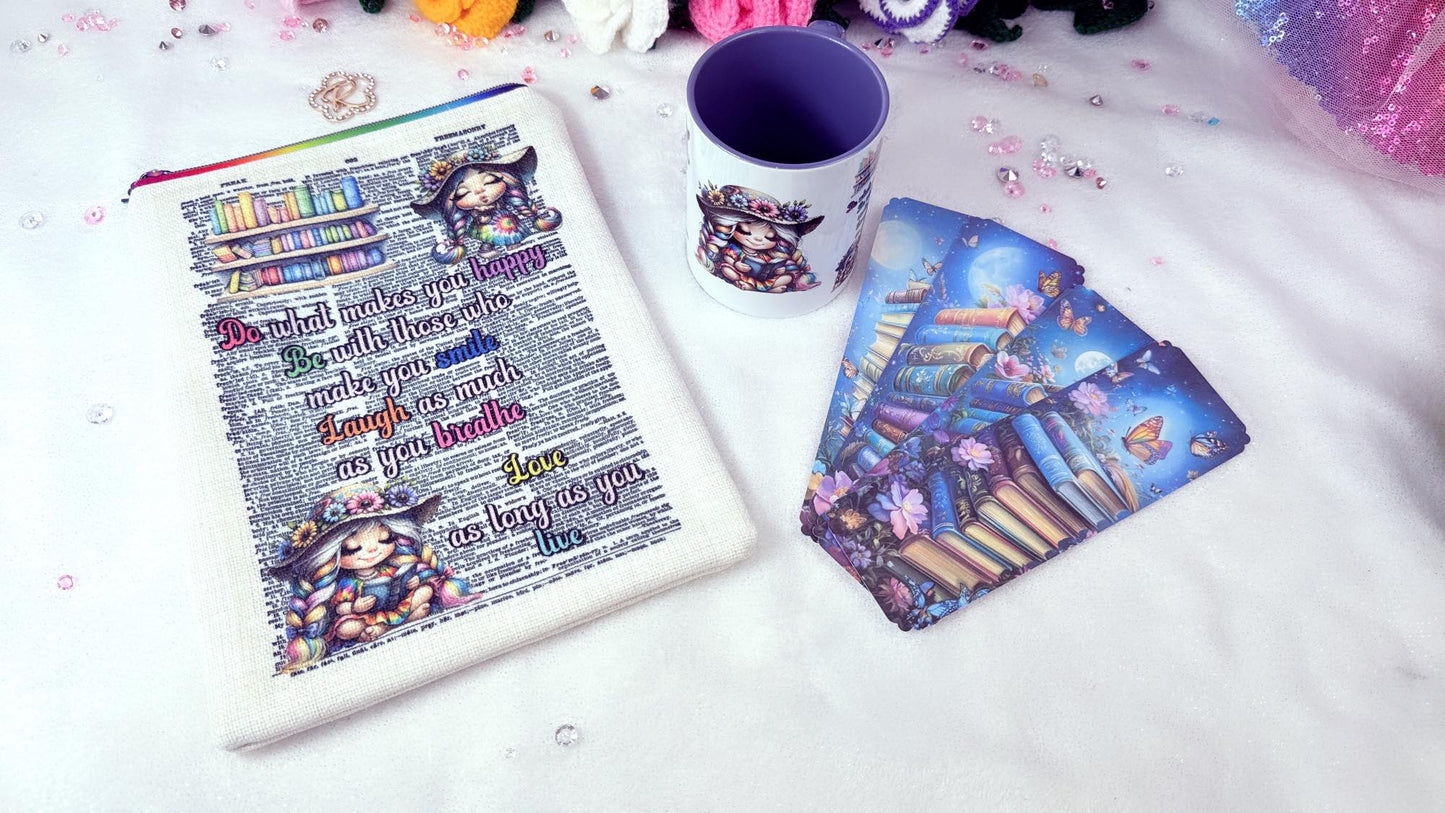 Personalised gift set for a book lover by roxana roveno designed book sleeve with a rainbow girl reading and a mug matching the book sleeve, also set of laminate bookmarks erfect gift for a bookish