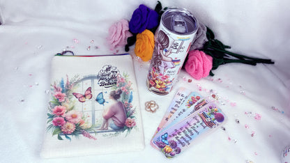 Blind date with a book personalised gift set perfect gift for a book lover designed by roxana roveno which include a book sleeve with a gitl and flowers ant quote 'all things are possible' a tumblerand a set of laminated bookmarks