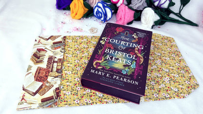 Whether it’s a hardback edition, a slightly larger paperback, or a collector’s piece, this cover provides the perfect balance of protection and elegance.

Crafted from high-quality cotton fabrics with vibrant, coordinated designs, each cover features a durable yet flexible padded lining, keeping your book safe from bent corners, scratches or accidental spills while on the go. perfect gift for any book lover, perfect protection for your special books