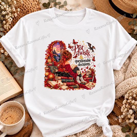 White 100% cotton book lover T-shirt featuring a colourful autumn fantasy reading illustration and Plot Twists & Questionable Decisions quote, by RoxanaRovenoGifts.
 Copy alt text