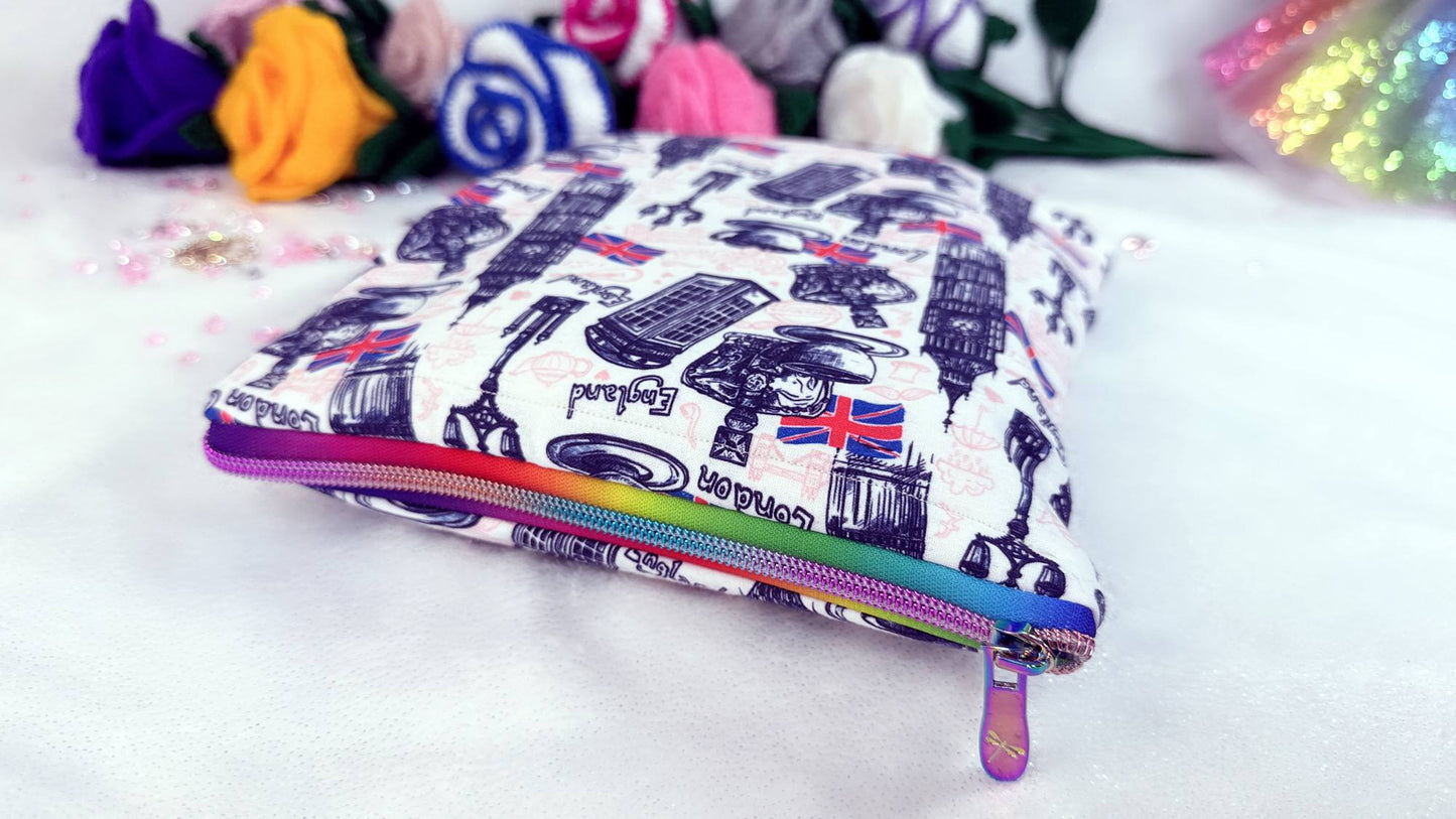 premium handmade book sleeves, designed for book lovers who care about their books as much as they care about reading them.  our book covers are perfect for protecting your books on the go—no more bent corners or damaged covers in your handbag or backpack. crafted by Roxana Roveno perfect gift for paper back readers with rainbow zip