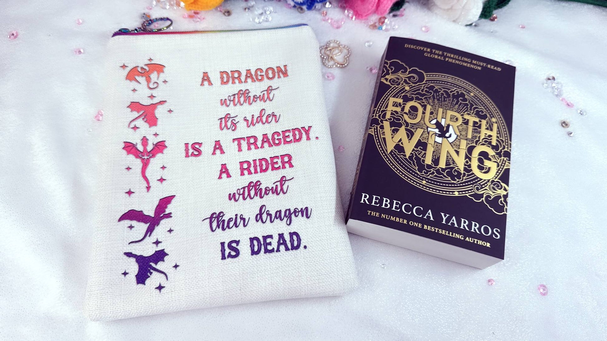 handmade personalised book sleeve "Dragon Rider, Book Lover"&nbsp;made from the highest quality materials and vibrant colors.&nbsp;The rainbow zip adds a stylish touch while providing excellent protection for your books, ensuring they remain safe wherever you go. These unique book sleeve provide protection for your favorite books, journals or notebooks. a dragon without its rider is a tragedy. a rider without its dragon is dead. designed by roxana roveno