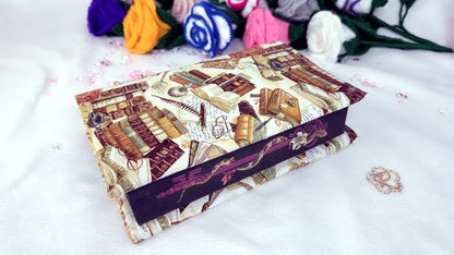 Whether it’s a hardback edition, a slightly larger paperback, or a collector’s piece, this cover provides the perfect balance of protection and elegance.

Crafted from high-quality cotton fabrics with vibrant, coordinated designs, each cover features a durable yet flexible padded lining, keeping your book safe from bent corners, scratches or accidental spills while on the go. full protection handmade by Roxana Roveno